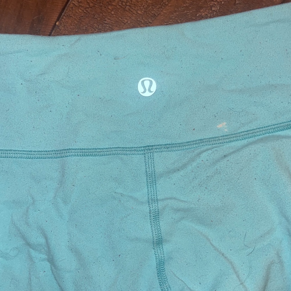 Lululemon teal leggings size 4